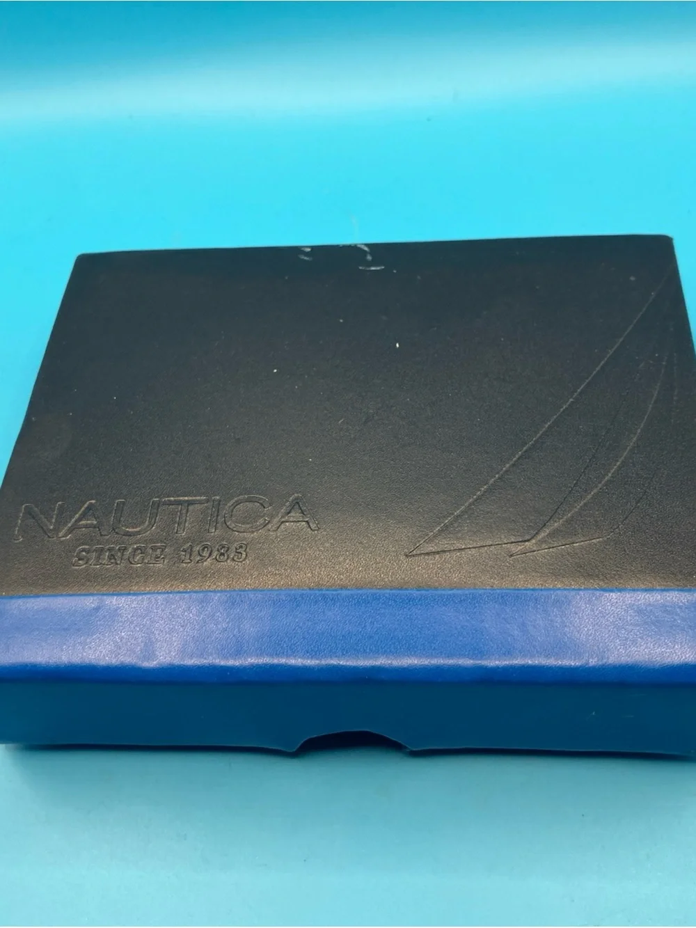 Nautica Black Pebbled Leather Passcase Wallet with Logo Plaque